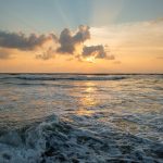 Ocean waves at sunset