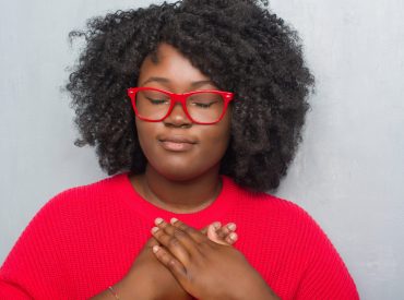 Young,African,American,Plus,Size,Woman,Over,Grey,Grunge,Wall